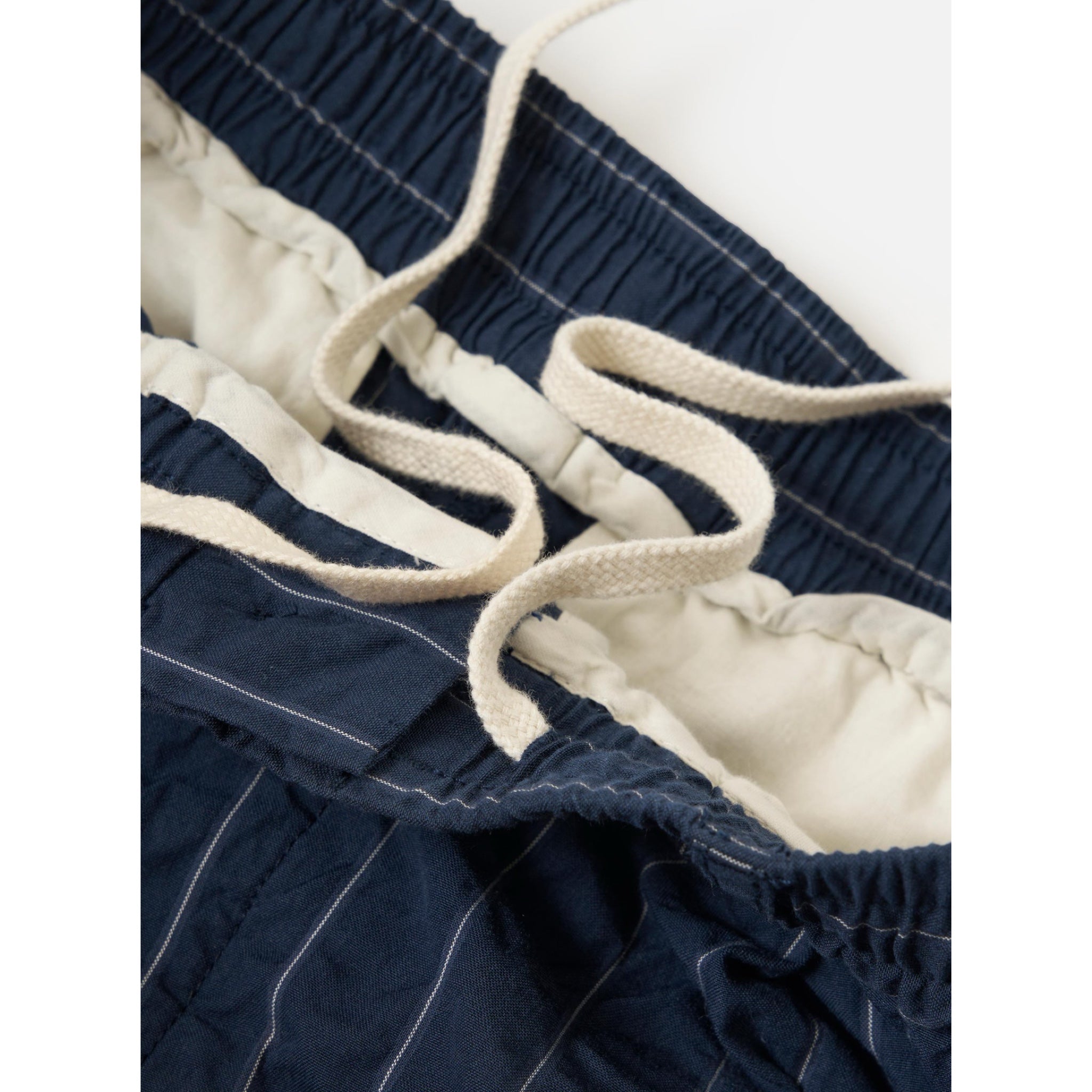 Universal Works Pleated Track Pant Chester Stripe navy